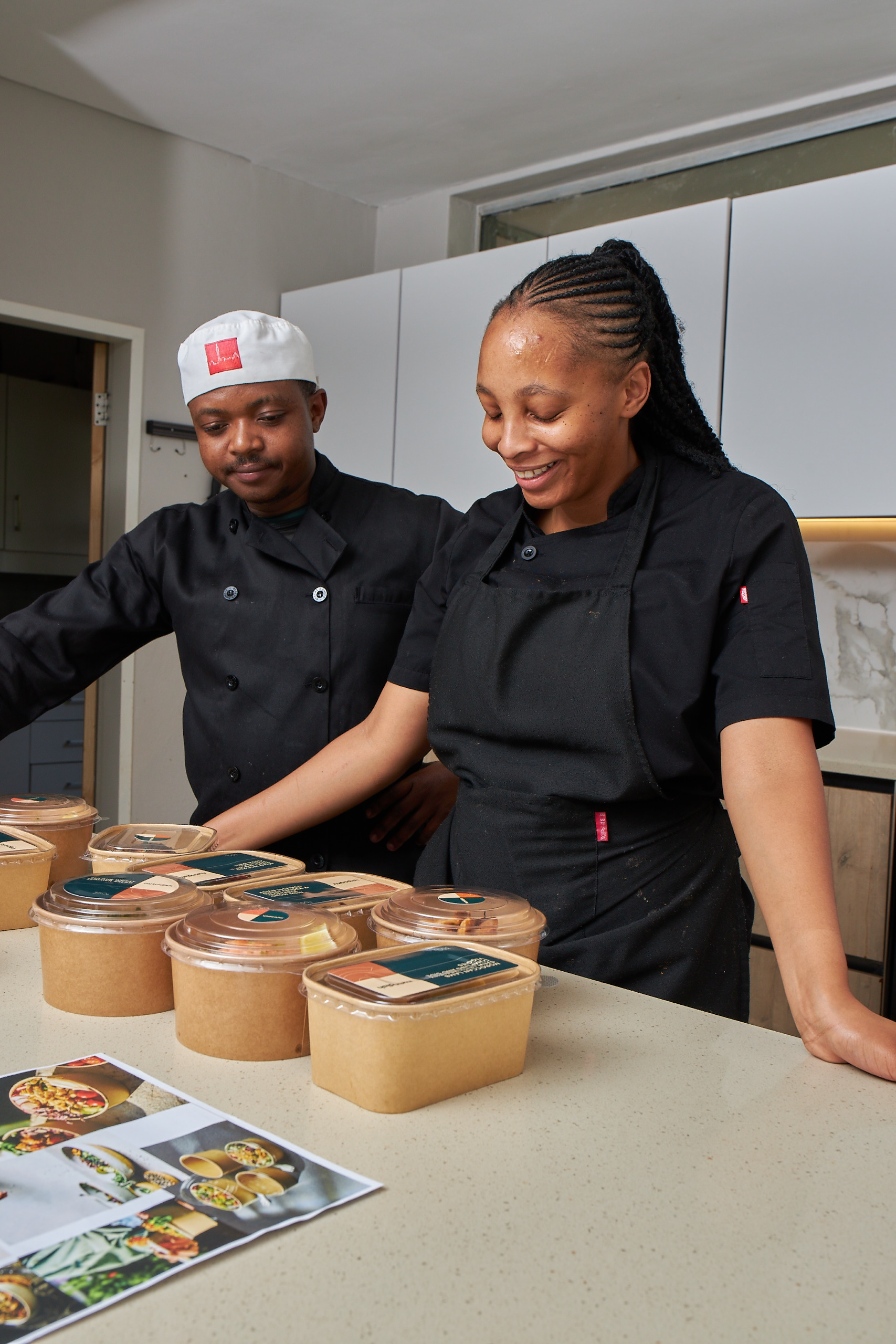 Nutridish chefs in Johannesburg kitchen preparing fresh healthy meals with care and authenticity.